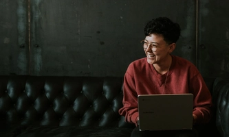 A woman working with a laptop