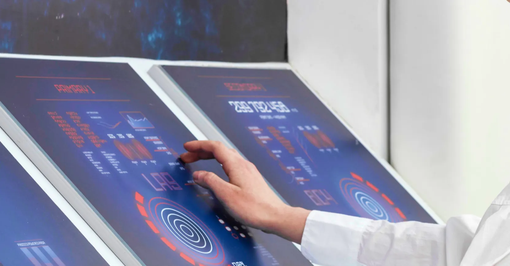 side view woman working digital monitors